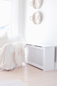 white wood radiator cover in colonial home - pinteresting plans blog
