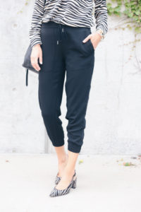 workwear fall fashion trends 2019 - black joggers withh zebra heels pinteresting plans fashion blogger Rachel Moore of connecticut in Ann Taylor