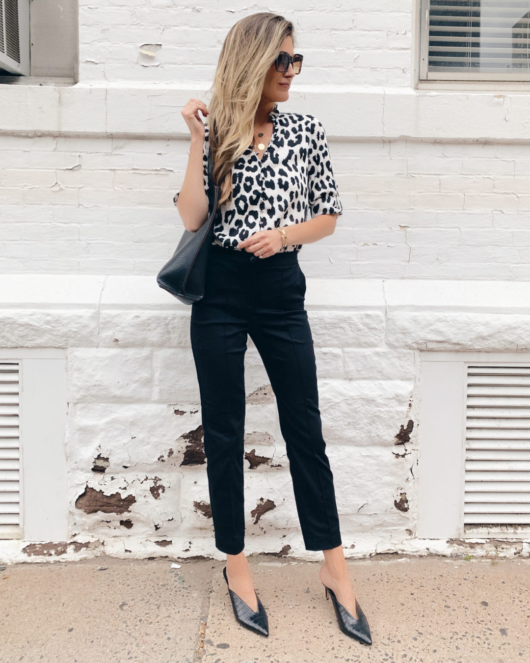Fashion blogger wearing express office attire high waisted seamed black ankle pants