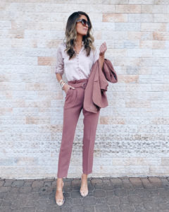 new spring workwear trends - monochrome pink outfit with clear heels to wear to the office