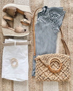 Ann Taylor gingham flutter sleeve top with white shorts laser cut espadrilles woven summer bag and Victoria Emerson wrap bracelet