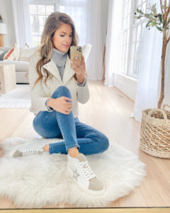 casual fall outfit with white high top star sneakers and skinny jeans