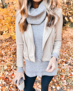 fall outfit idea with cream moto jacket with and grey turtleneck sweater