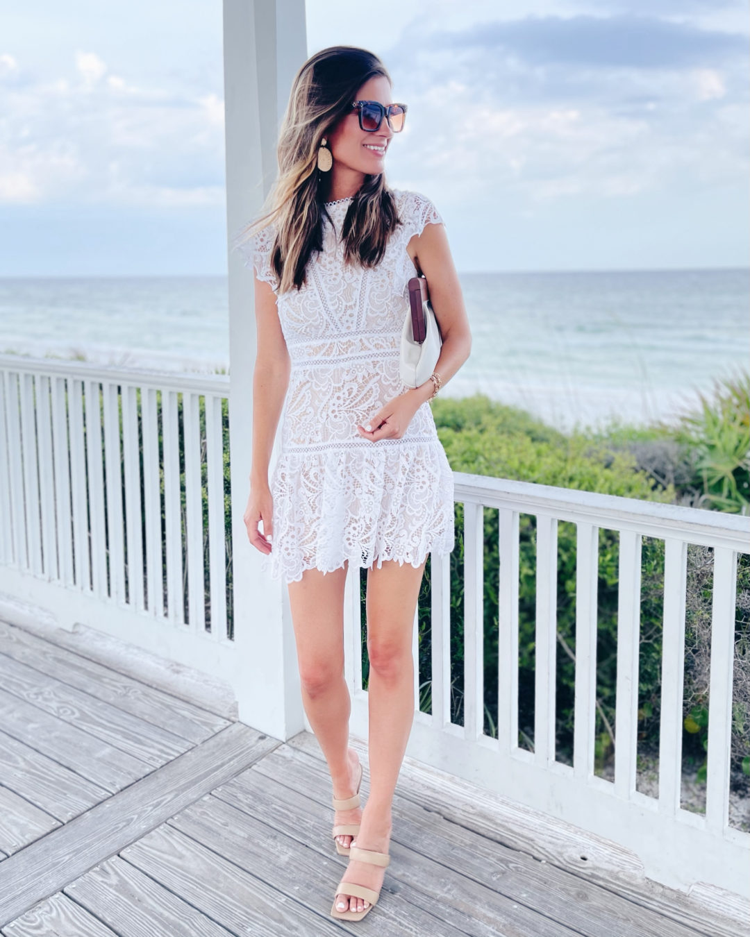 tall fashion blogger wearing white lace mini summer dress