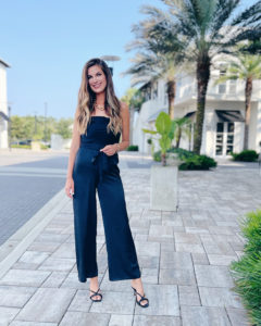 black satin belted cowl neck wide leg jumpsuit