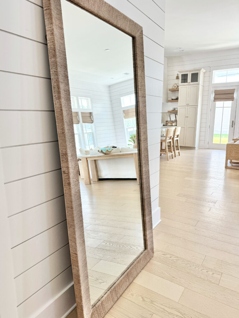 large woven statement floor mirror for neutral home